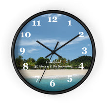 Load image into Gallery viewer, 10 inch round wall clock showing a picture of Palm Island beach in St. Vincent and the Grenadines