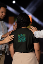 Load image into Gallery viewer, black t-shirt with QR Code for 'compassion is soul food' on the back
