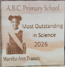 Load image into Gallery viewer, Wooden plaque with engraved text and a portrait of a young girl, awarded 'Most Outstanding in Science 2026'.