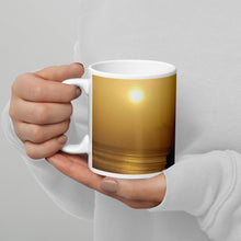 Load image into Gallery viewer, 11oz ceramic coffee mug showing a caramel colored sunset off Edinboro Point in St. Vincent and the Grenadines