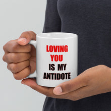 Load image into Gallery viewer, 11oz ceramic coffee mug with the caption 'Loving you is my antidote'