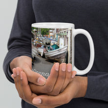 Load image into Gallery viewer, St. Vincent and the Grenadines Protecting Boats From A Storm in Bottom Town White glossy mug