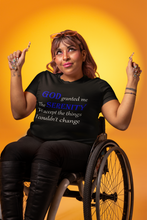 Load image into Gallery viewer, woman sitting in a wheelchair wearing a black t-shirt stating God granted me the serenity to accept the things I couldn't change