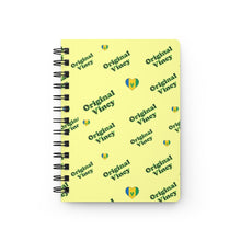 Load image into Gallery viewer, Yellow spiral notebook/journal with 'original vincy' written in camouflage green with hearts containing the St. Vincent and the Grenadines flag.
