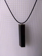 Load image into Gallery viewer, solid black volcanic ash pendant in the shape of a rhombus