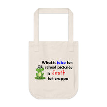 Load image into Gallery viewer, organic canvas tote bag with a drawing of a green frog and the caption 'what is joke foh school pickney is death foh crappo'