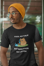 Load image into Gallery viewer, Black 'Fool Ah Talk But Nah Fool Ah Listen' t-shirt with white lettering