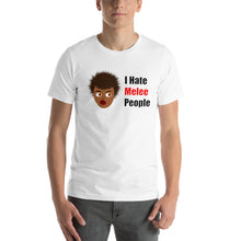 Load image into Gallery viewer, model wearing a white unisex t-shirt with an African-American woman's cartoon head and the caption 'I hate melee people'