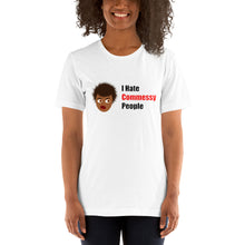 Load image into Gallery viewer, model wearing a white unisex t-shirt with an African-American woman's cartoon head and the caption 'I hate commessy people'