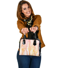 Load image into Gallery viewer, small shoulder bag with pink and peach wisps design and black paneling 
