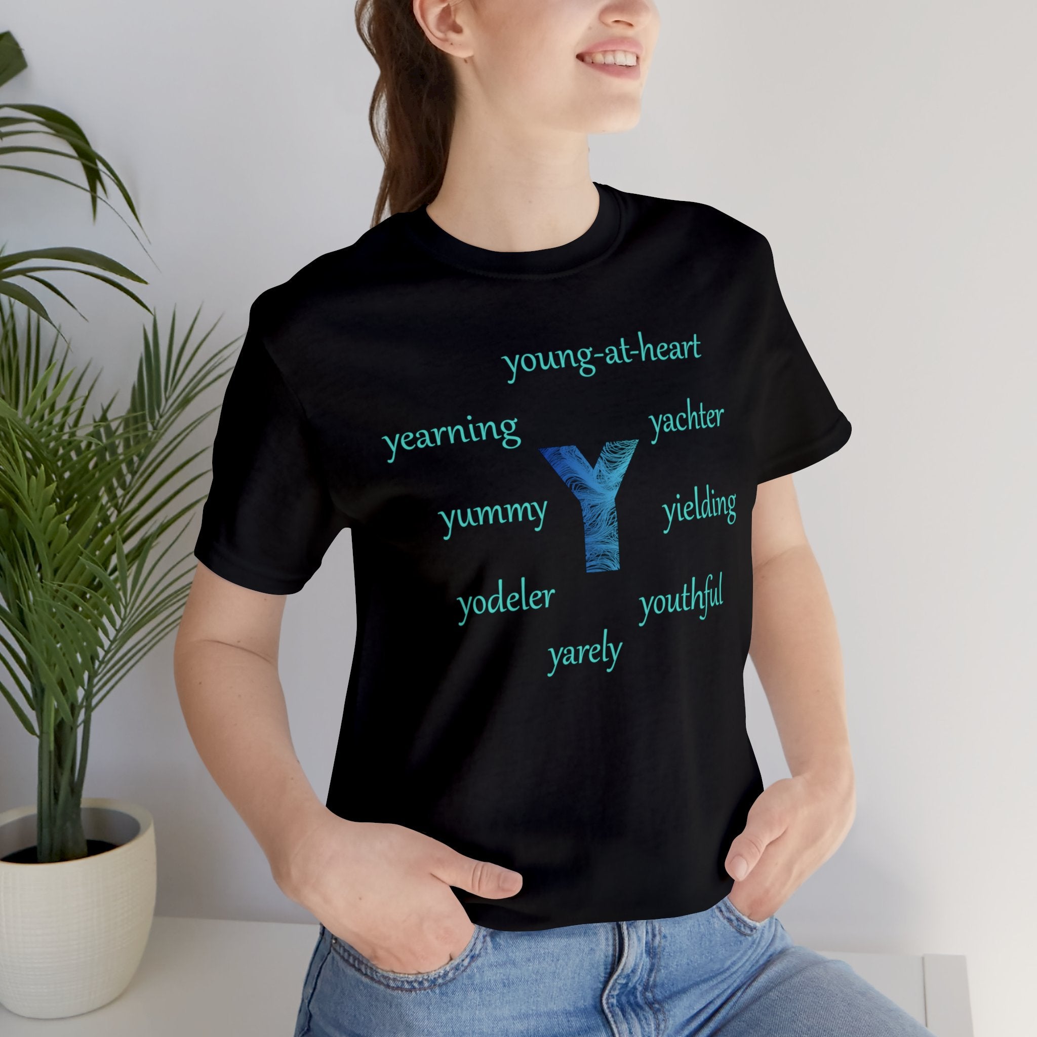 black unisex t-shirt with the letter Y surrounded by positive y words
