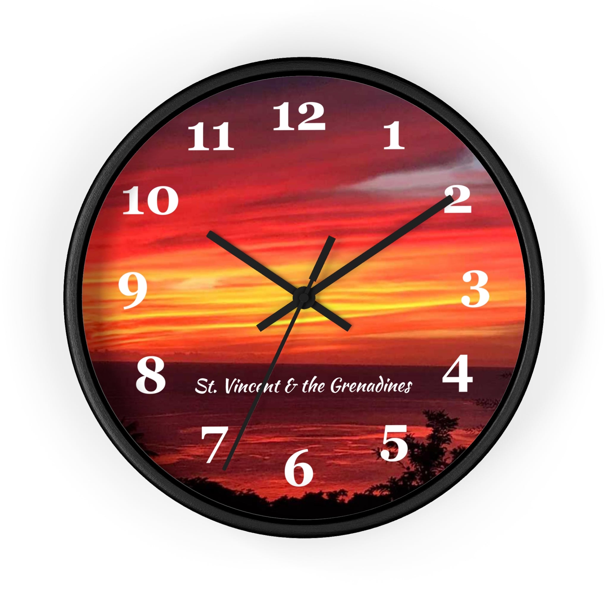10 inch round wall clock showing a photo of a vibrant sunset in St. Vincent and the Grenadines