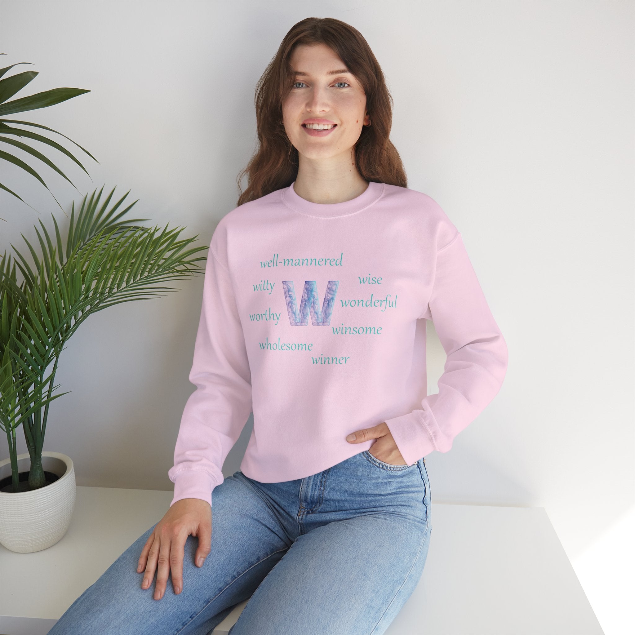 pink sweatshirt with the letter W surrounded by motivating W words