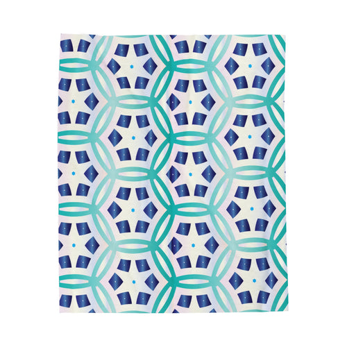 velveteen plush blanket with a blue hexagon design