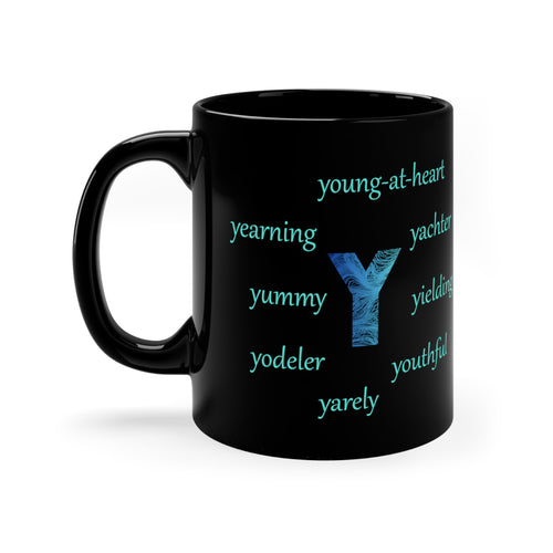 11oz black ceramic coffee mug with the letter Y surrounded by positive y words