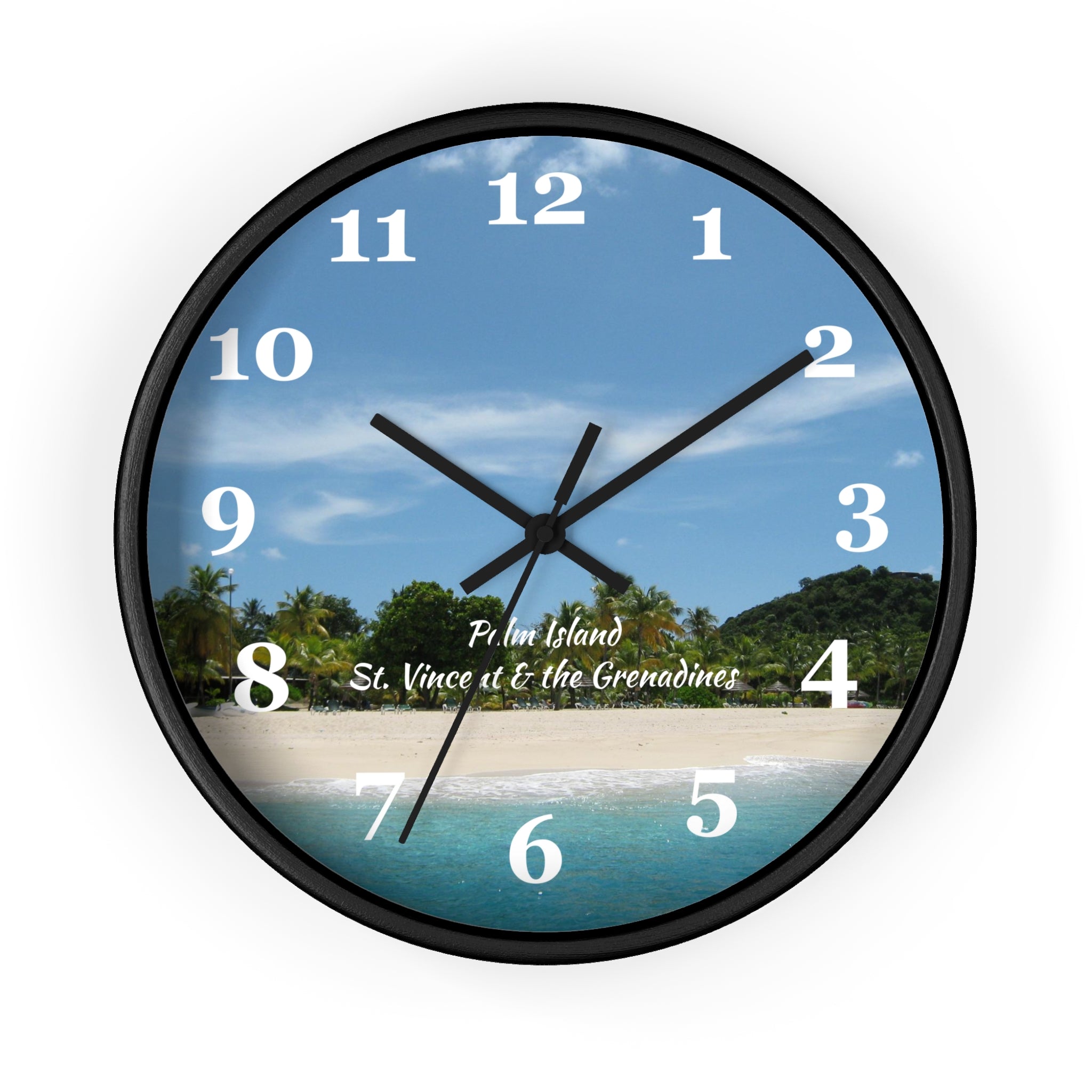 10 inch round wall clock showing a picture of Palm Island beach in St. Vincent and the Grenadines