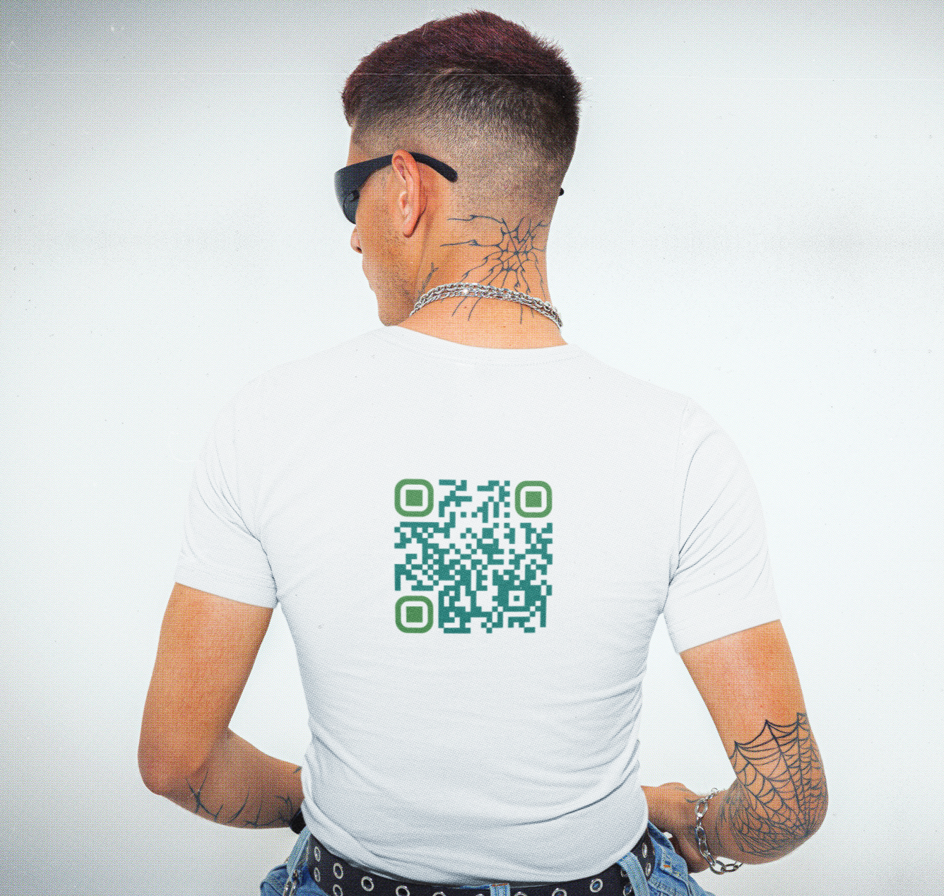 QR Code for 'block her on everything' on the back of a white t-shirt