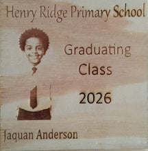 Load image into Gallery viewer, Wooden plaque with a portrait of a child and graduation information for  a Primary School.

