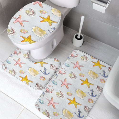 3 piece bathroom set with a beach themed design of starfish, crabs, seashells and anchors