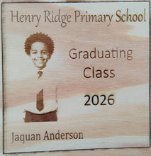 Load image into Gallery viewer, Wooden plaque with engraved text and a portrait of a child, indicating graduation from Henry Ridge Primary School for the class of 2026.
