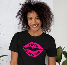 Load image into Gallery viewer, black t-shirt with pink lips and the caption &#39;love, success&#39; written one on each lip 
