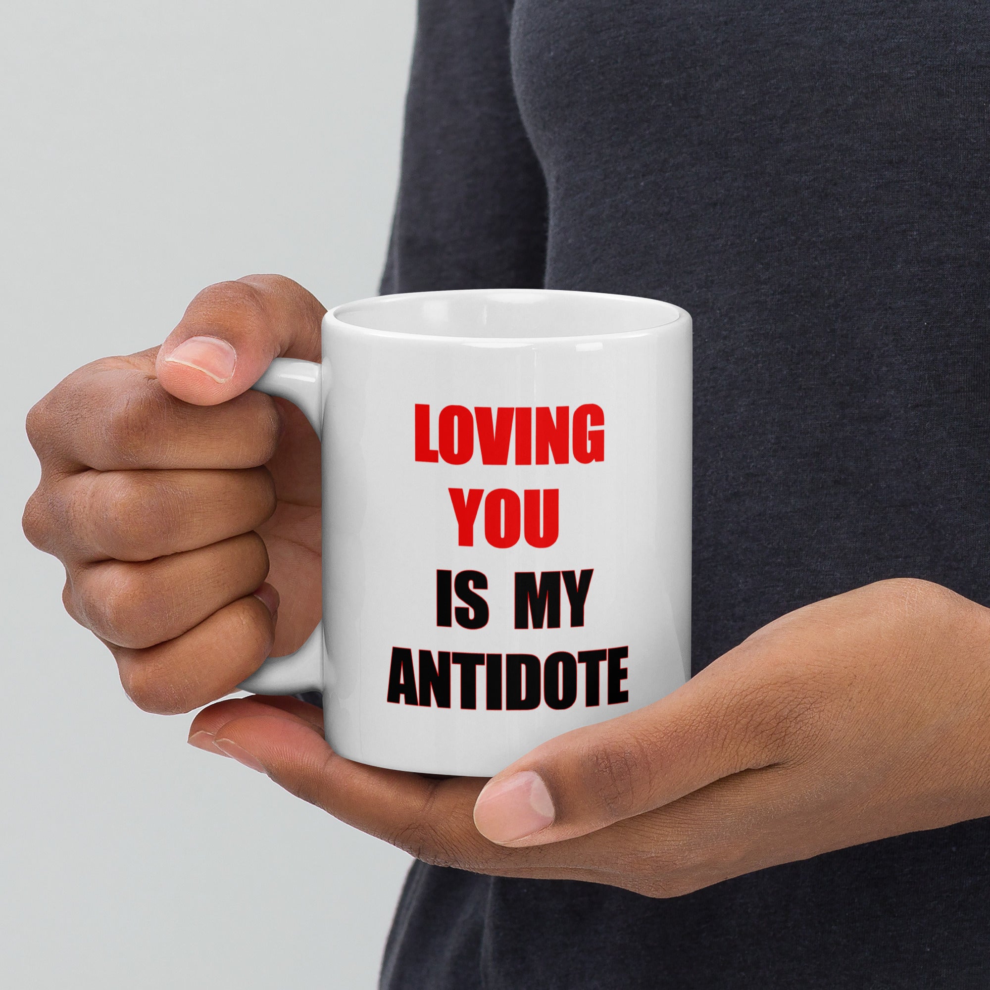11oz ceramic mug with the caption 'loving you is my antidote' in red and black letters