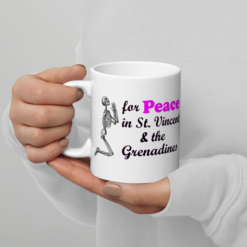 11oz ceramic mug with the image of a skeleton praying for  peace in St. Vincent and the Grenadines