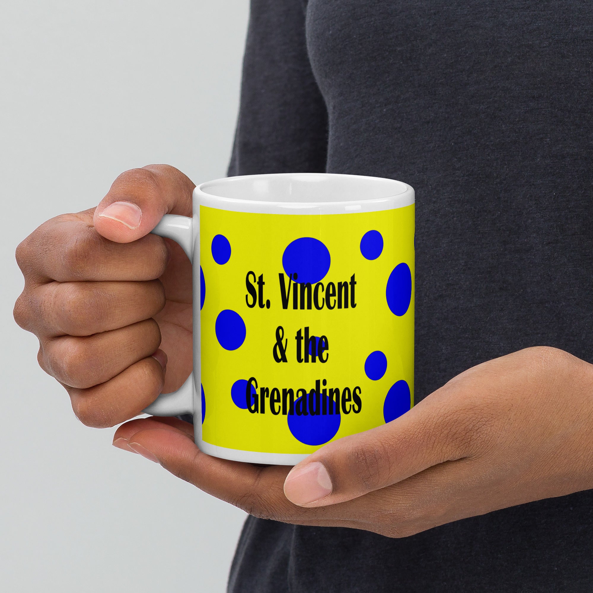 St. Vincent and the Grenadines 11oz ceramic mug  with blue spots on a yellow background