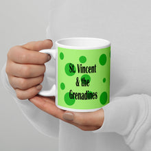 Load image into Gallery viewer, 11oz ceramic St. Vincent and the Grenadines mug with green spots on a green background
