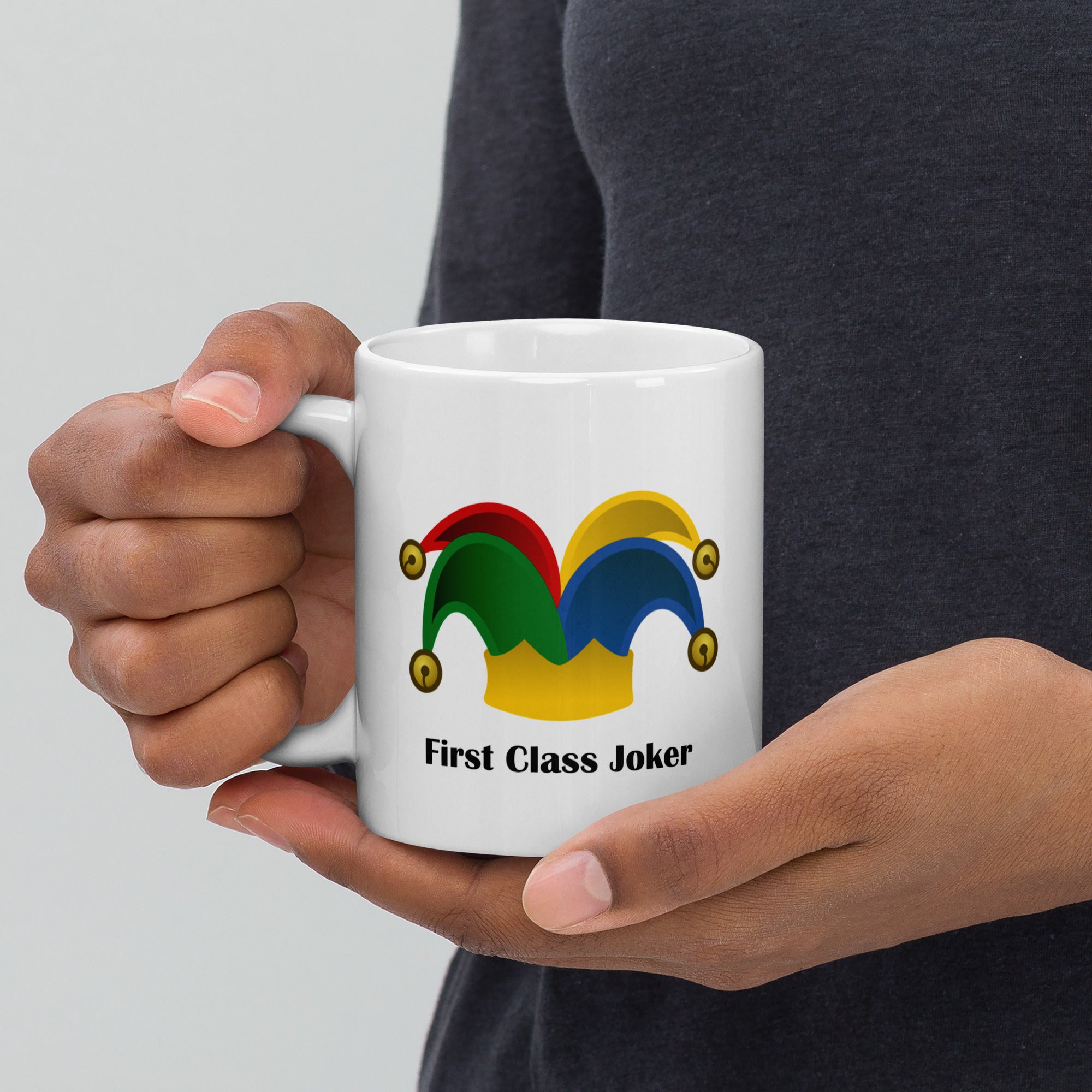 110z white ceramic mug with a multi-colored joker's hat and the caption 'first class joker'