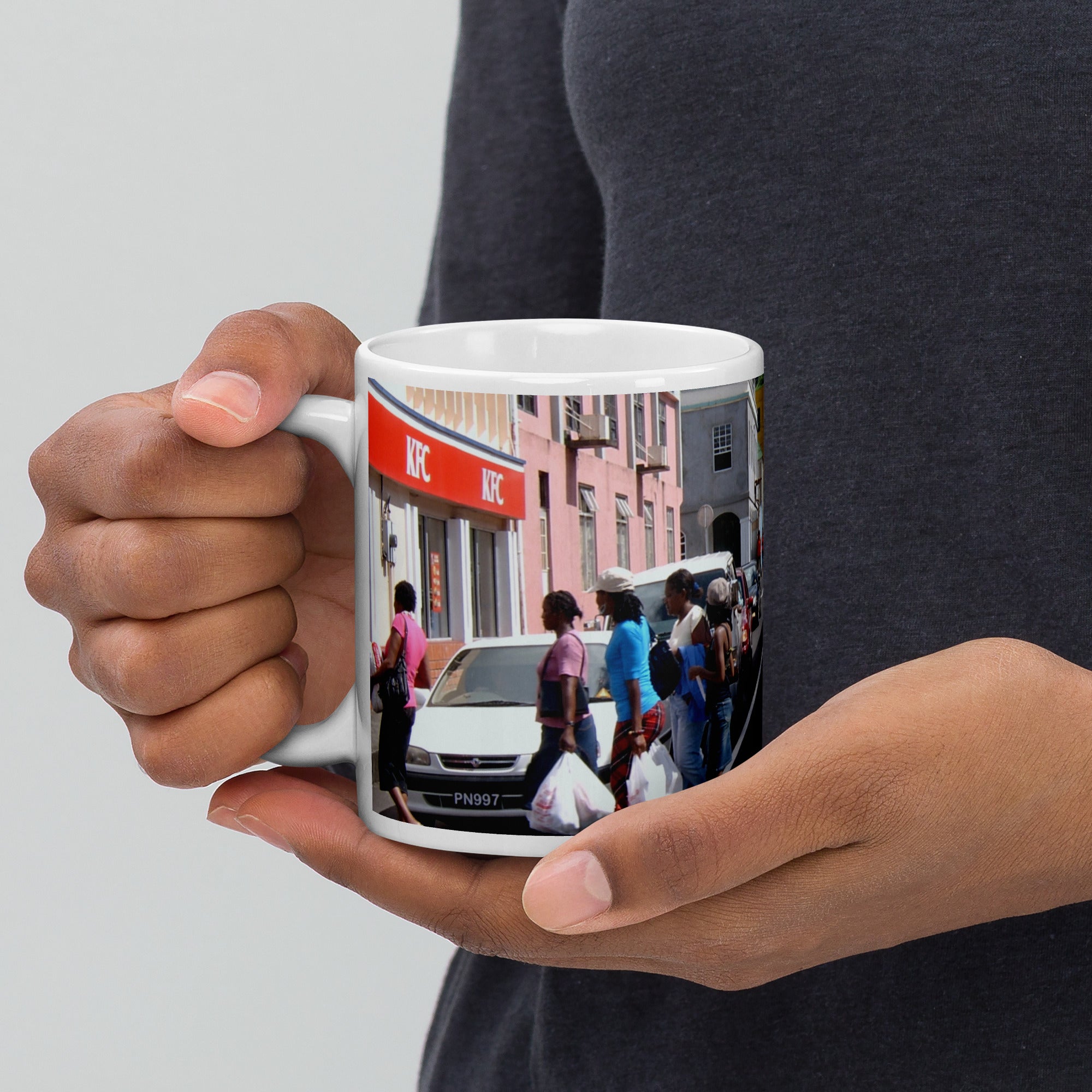11oz coffee mug showing a picture of Saturday shoppers in Kingstown, St. Vincent and the Grenadines