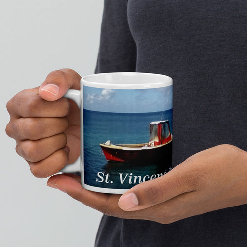 11oz ceramic mug with a picture of 2 boats bobbing in the water in St. Vincent and the Grenadines
