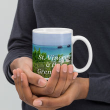 Load image into Gallery viewer, 11oz coffee mug featuring a beautiful picture taken on the Caribbean island of Canaouan in St. Vincent and the Grenadines.
