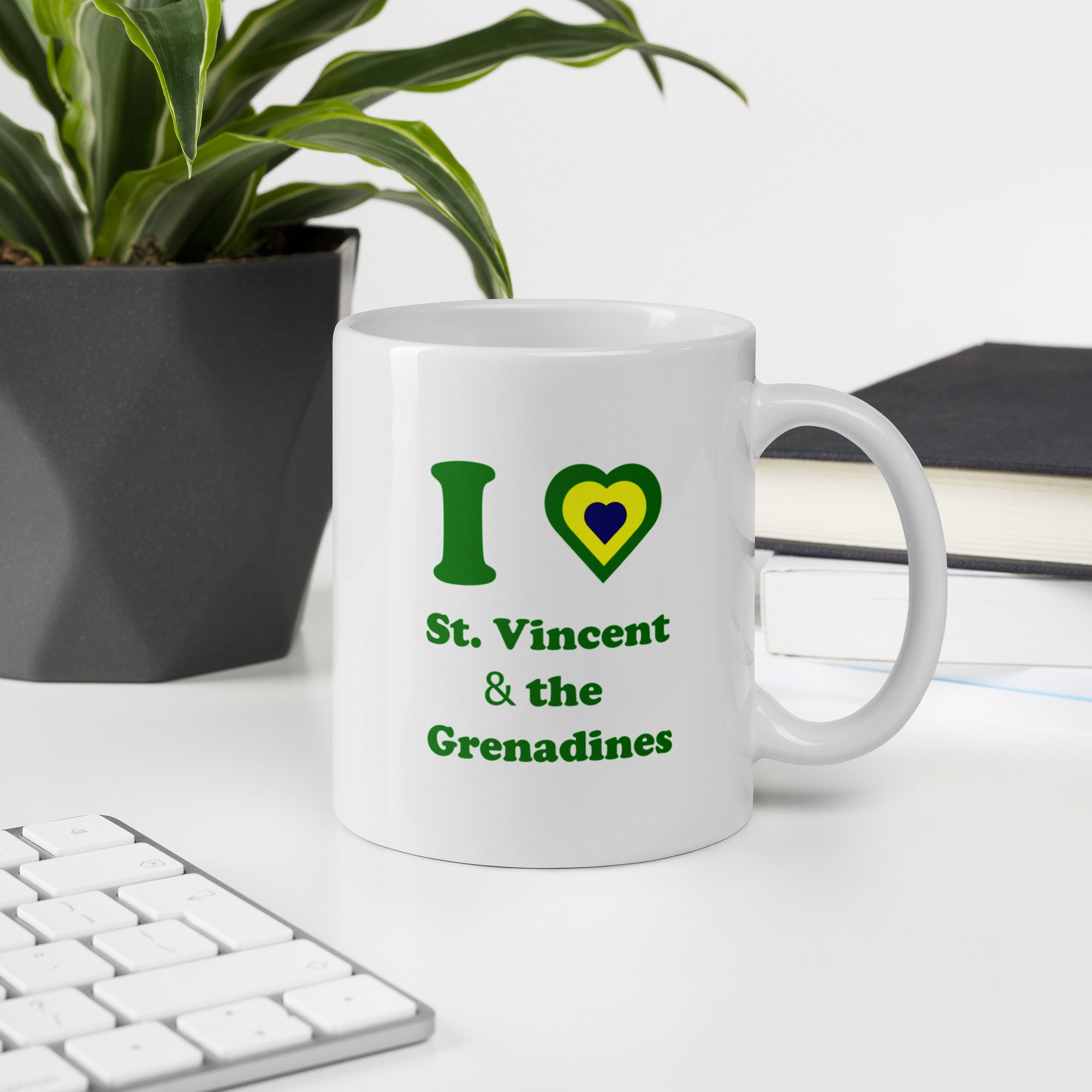 I love St. Vincent and the Grenadines 11oz coffee mug with green lettering and a national colored heart