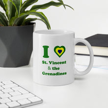Load image into Gallery viewer, I love St. Vincent and the Grenadines 11oz coffee mug with green lettering and a national colored heart
