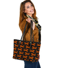Load image into Gallery viewer, small leather tote bags featuring a design of brown horses prancing
