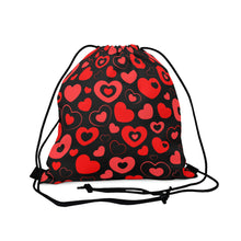 Load image into Gallery viewer, black drawstring bag with red and pink hearts in hearts
