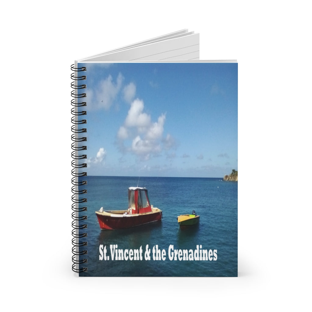 spiral lined notebook showing two boats in Mayreau in St. Vincent and the Grenadines