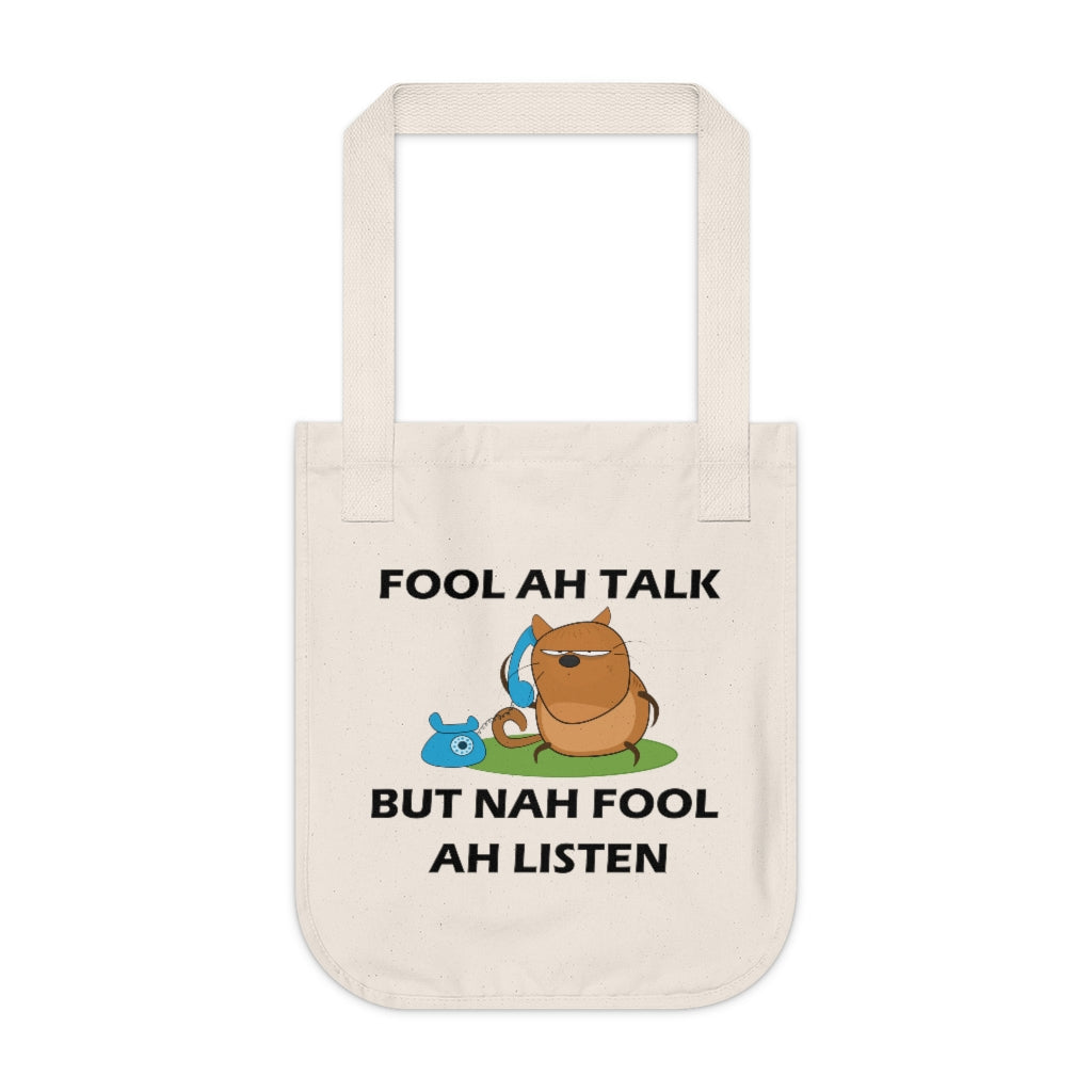eco-friendly organic natural color canvas tote bag with an illustration of a cat holding a phone with the caption 'fool ah talk but nah fool ah listen'