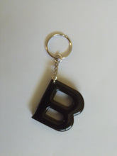 Load image into Gallery viewer, Volcanic Ash and Resin Letter Keyring (Solid Black)
