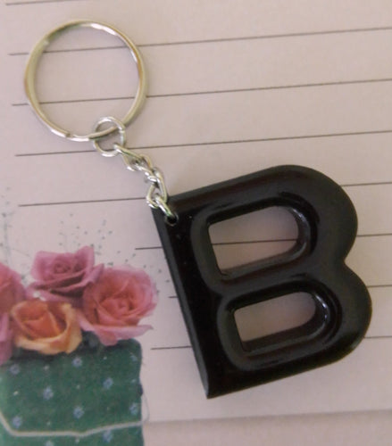 solid black volcanic ash and resin keyring 