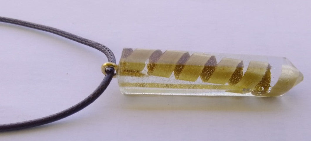 Banana leaf pendant in the shape of a hexagonal prism