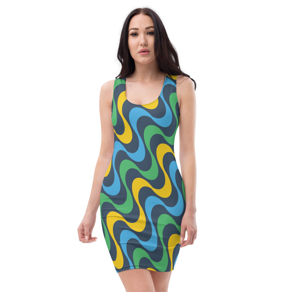 woman wearing form fitting dress with squiggles  in Vincy colors of blue, yellow and green