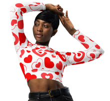 Load image into Gallery viewer, white long sleeve crop top with red and pink hearts in hearts design.
