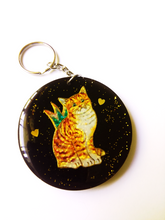 Load image into Gallery viewer, volcanic ash keyring/bag ornament decorated with a cat and hearts
