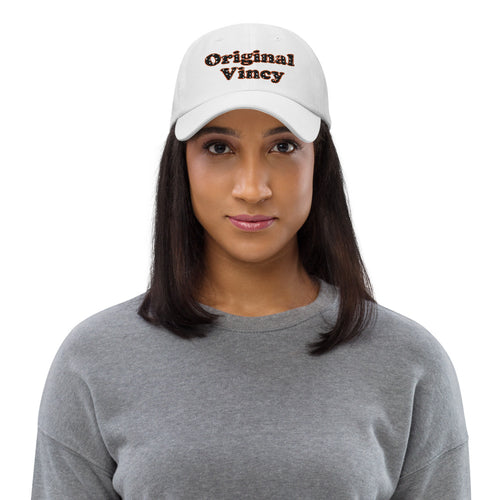 White dad hat with 'original vincy' written in black and red letters.