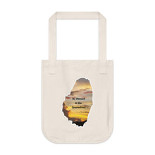 Load image into Gallery viewer, Eco-friendly organic canvas tote bag with a photograph taken of a sunset in St. Vincent and the Grenadines.  The photo is framed in the shape of the mainland of St. Vincent
