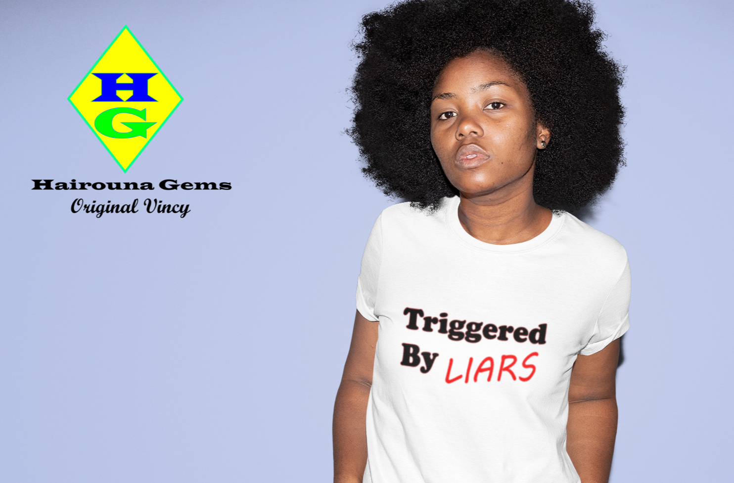 model wearing a white t-shirt with caption 'triggered by liars' in black and red lettering