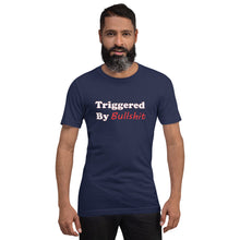 Load image into Gallery viewer, navy blue t-shirt with the caption &#39;triggered by bullshit&#39; written in white and red letters.
