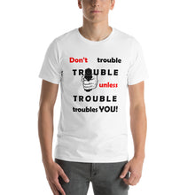 Load image into Gallery viewer, White t-shirt sporting the motto &#39;don&#39;t trouble trouble unless trouble troubles you&#39; in black and red letters and a hand holding a gun.
